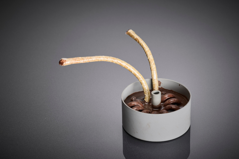 L'inductance à noyau en pot (potcore) utilisée constitue le composant HF central du convertisseur DC/DC et illustre la conception compacte rendue possible par l'utilisation de fils de litz RUPALIT® Safety optimisés pour la haute fréquence.