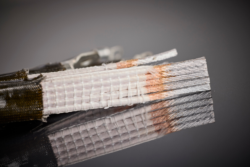 Détail du fil de litz RUPALIT® Planar profilé avec un facteur de remplissage en cuivre élevé pour une répartition uniforme du courant dans les enroulements plats.